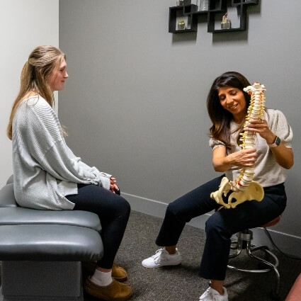 Dr Safina showing patient