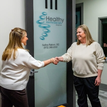 our team welcoming patient into office