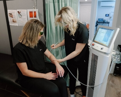 Old Town patient being treated with laser therapy