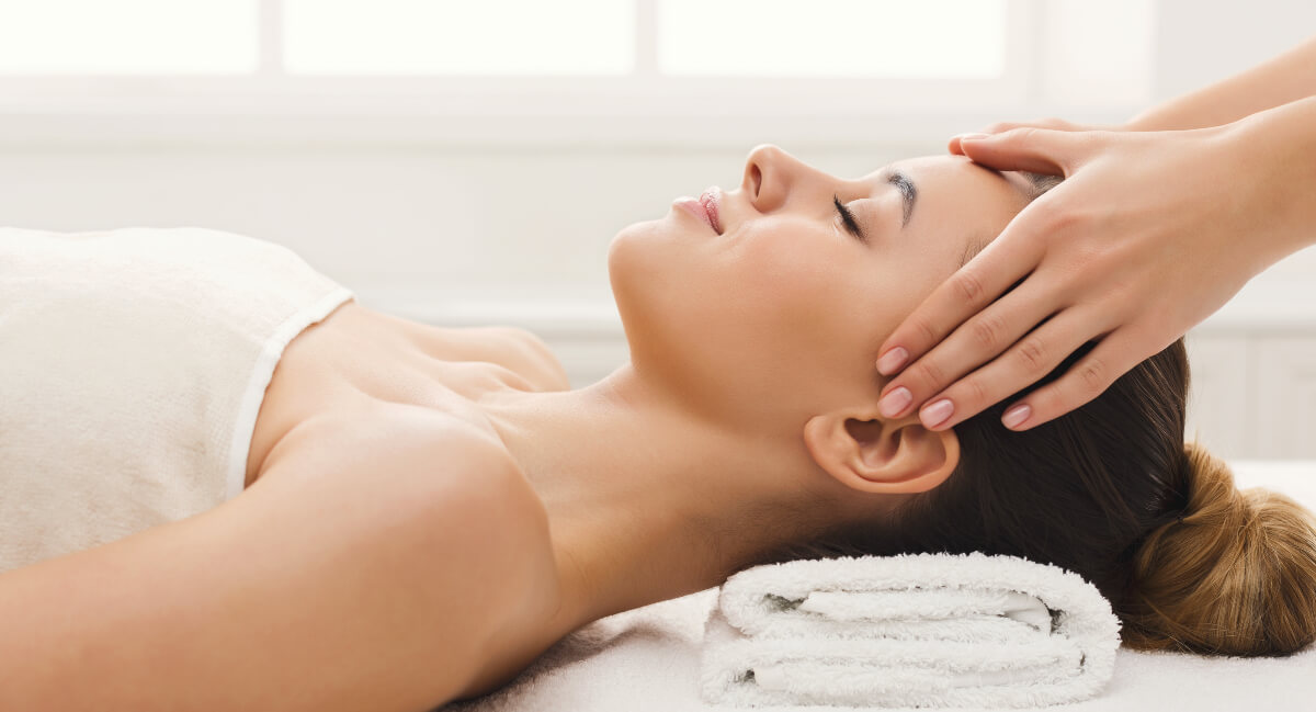 Female patient relaxed head massage