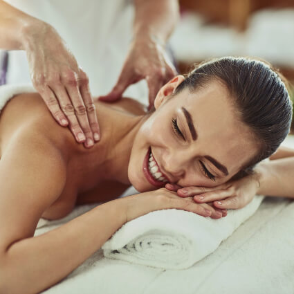 Female patient relaxed shoulder massage