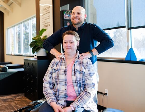 New Hope chiropractor Dr Matthew adjusting patients upper back