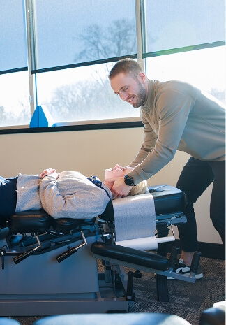 New Hope chiropractor Dr tanner adjusting patients neck