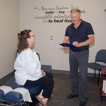 Dr. Randy consulting with patient