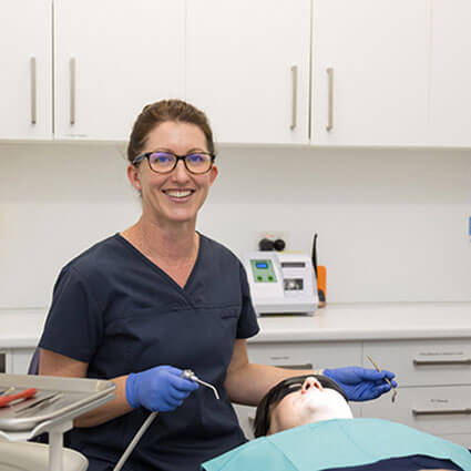 Dentist with patient