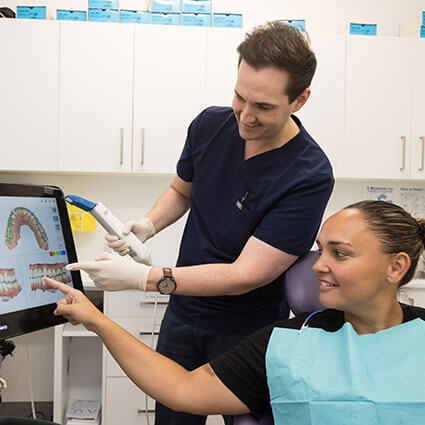 Dentist with patient