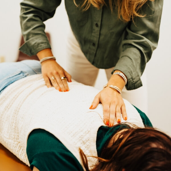 Somerset chiropractor Dr. Mo adjusting adult patient