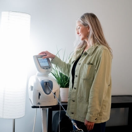 Lee's Summit chiropractor setting up Spinal Decompression table