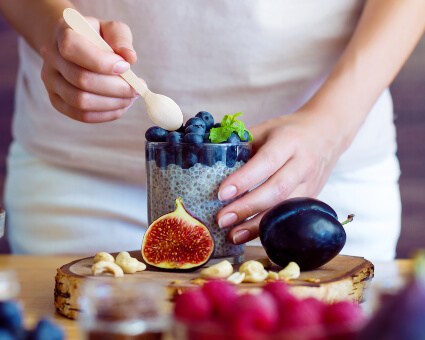 Woman preparing a healthy smoothy