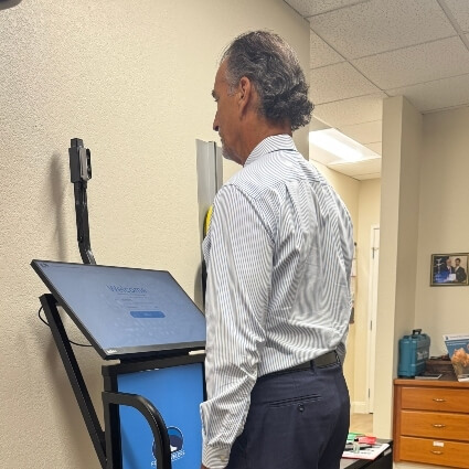 Our doctor doing a foot scan