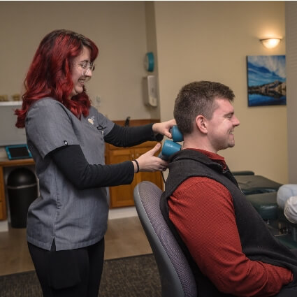 laser therapy on patients neck
