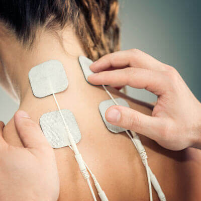 muscle stim pads on persons neck