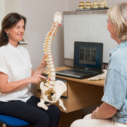 Consulting with patient