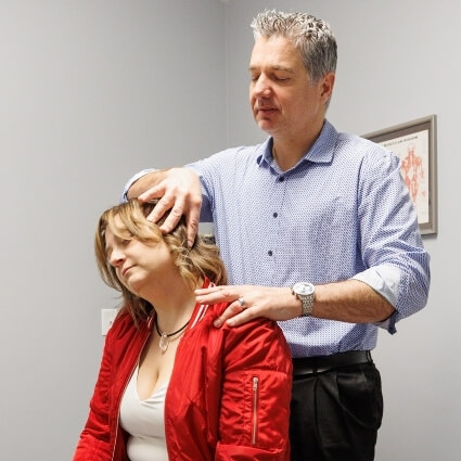 Female patient neck stretch