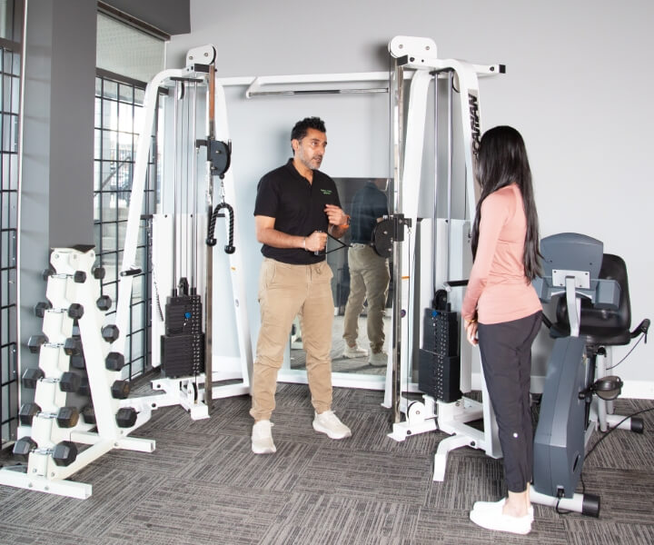 Female patient in active rehab session at Total Care Health