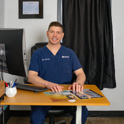 Dr. Davis at desk