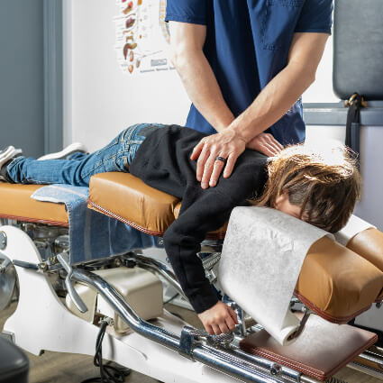 Adjusting child on table
