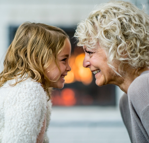 grandmother and daughter smiling