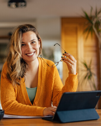 Smiling woman using a tablet