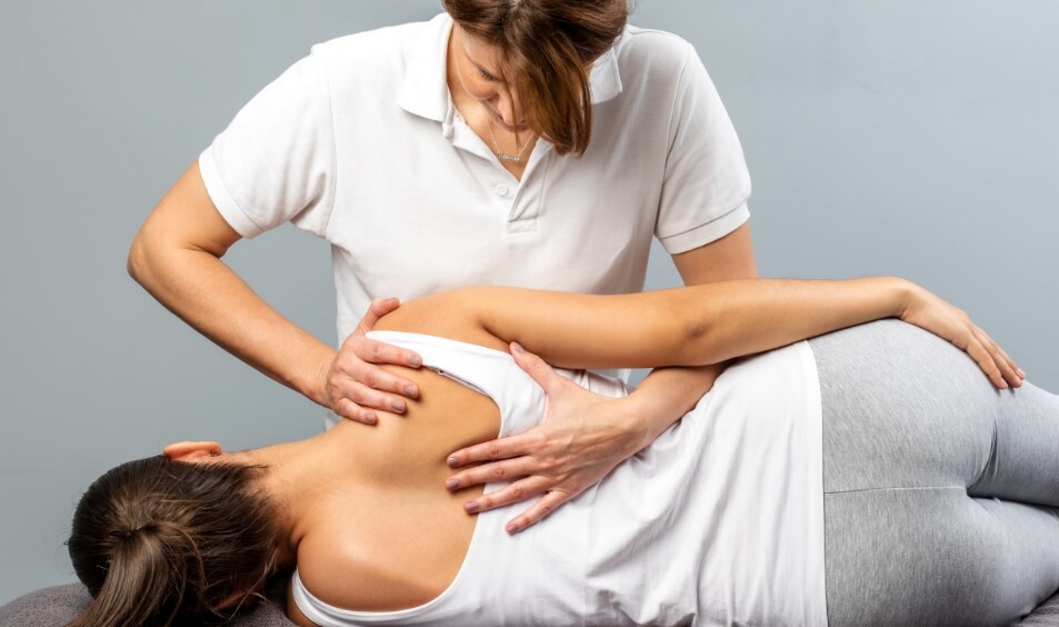 patient having back adjusted