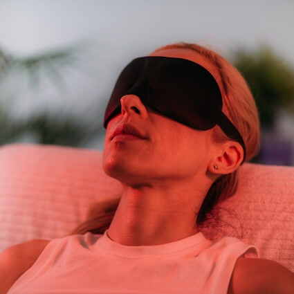 person during infrared sauna session