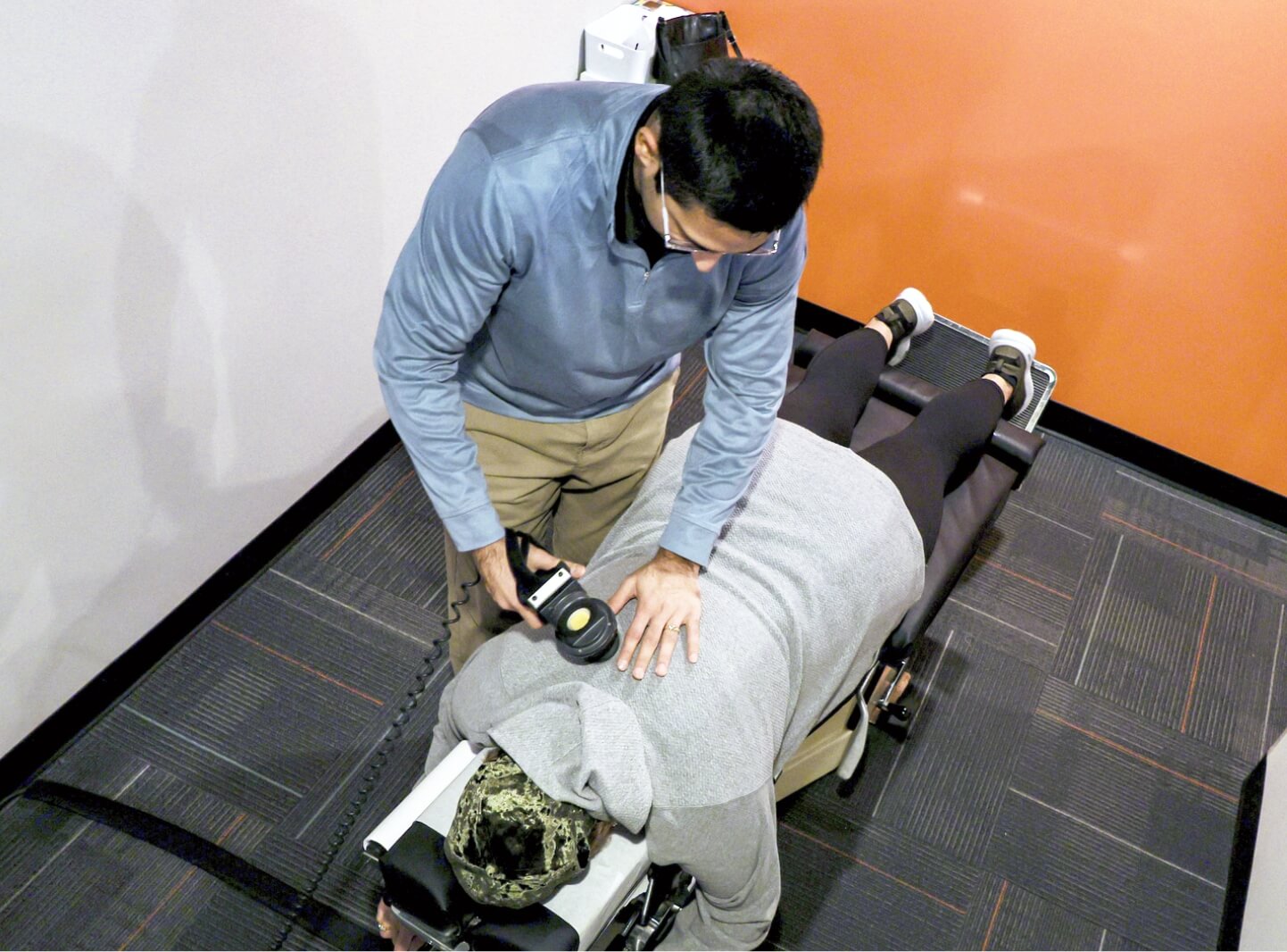 Flowery Branch patient receiving a chiropractic adjustment at Spine Chiropractic & Wellness