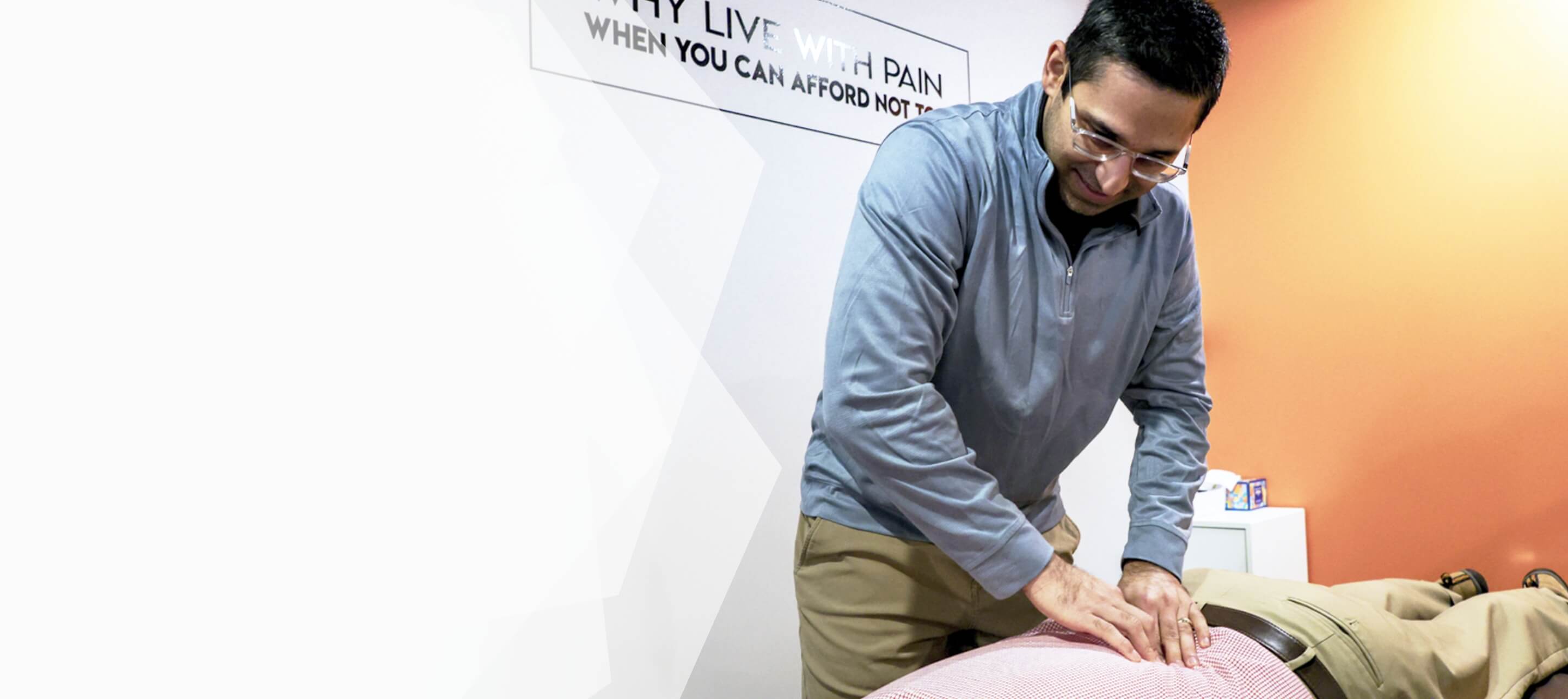 Female patient receiving a relaxing neck adjustment by Dr. Pranav