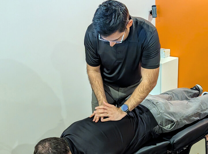 Flowery Branch patient receiving a chiropractic adjustment at Spine Chiropractic & Wellness