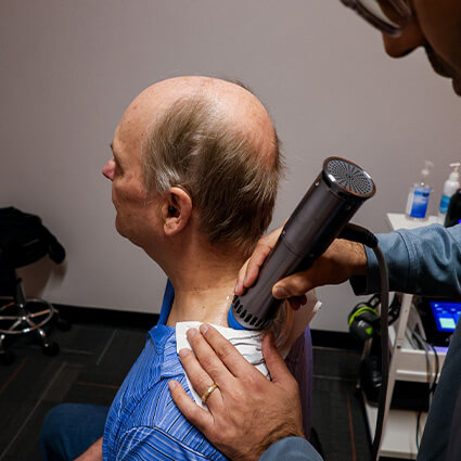 Shockwave therapy on shoulder