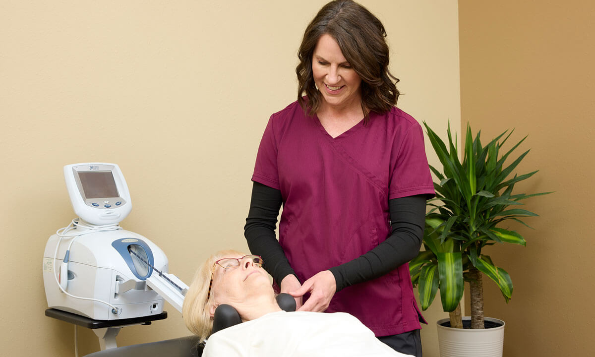 Woman getting cervical decompression