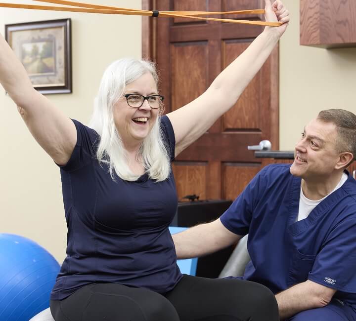 woman using exercise band