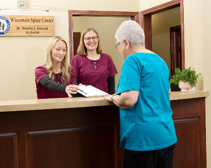 Patient checking at front desk