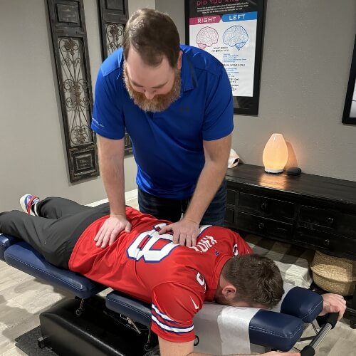 Burleson chiropractor Dr. James adjusting patient