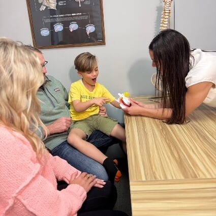 our chiropractor talking with patients