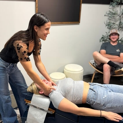 Anderson chiropractor Dr Sarah adjusting patients neck