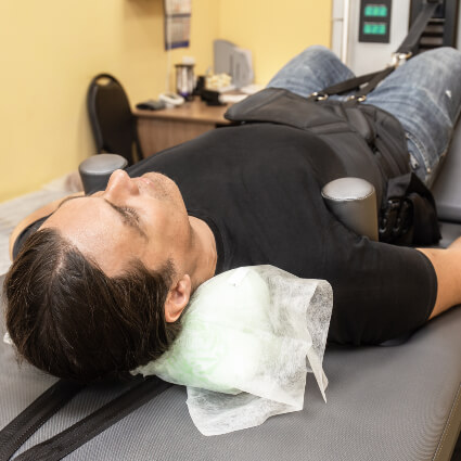 Male patient treated with Spinal Decompression Therapy