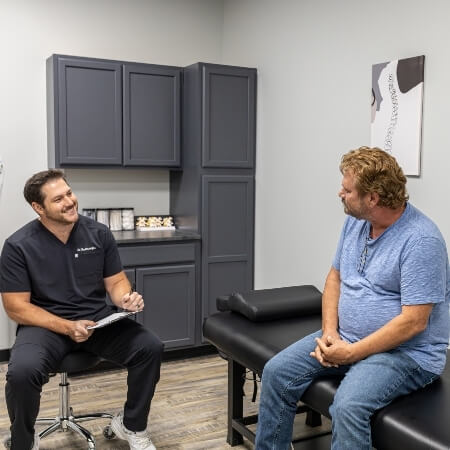 Dr Chad talking with patient