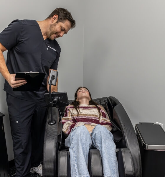 patient in chiropractic machine