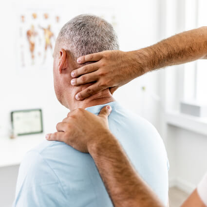 person having neck adjusted