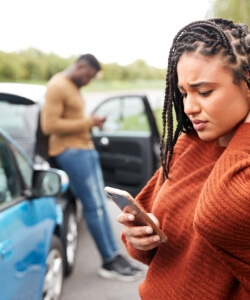 Woman with neck pain after car accident