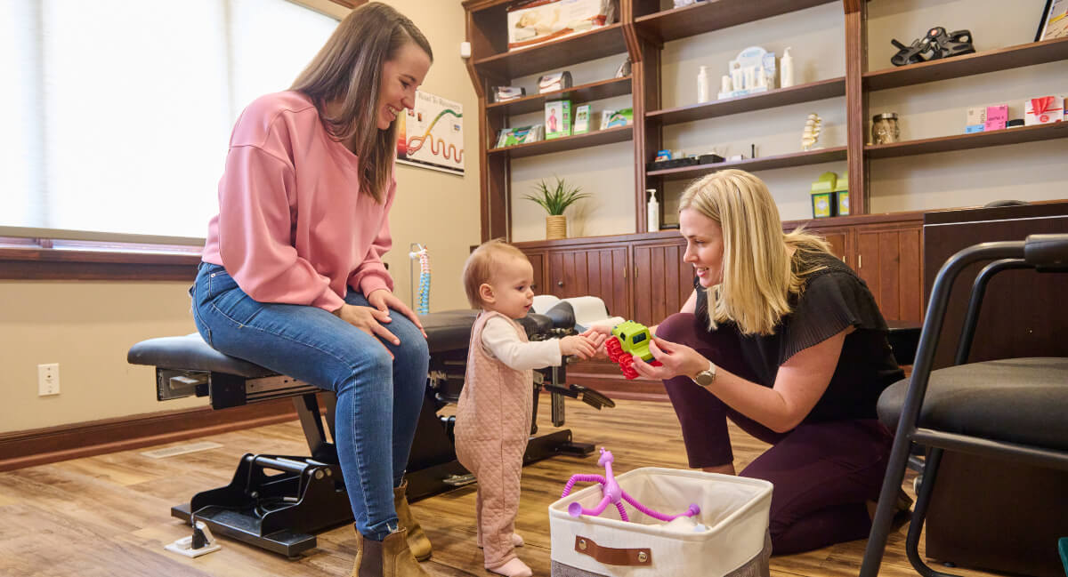 Dr. Lauren playing with pediatric patient