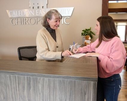 Patient filling in paperwork