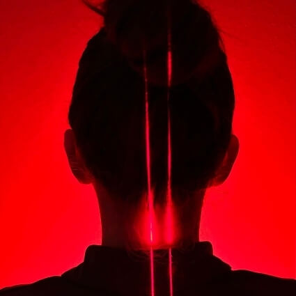 laser on persons neck