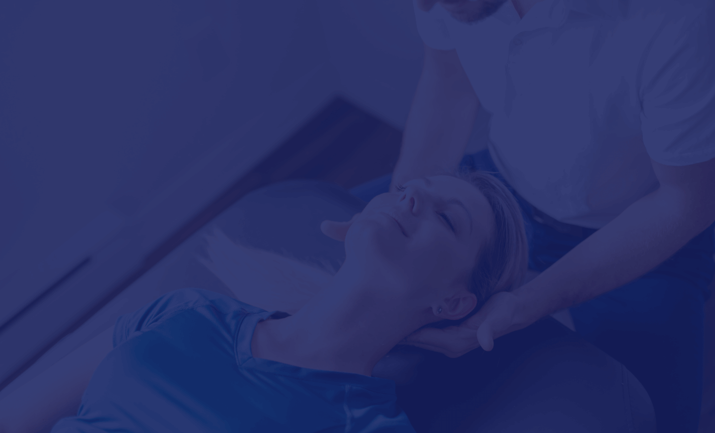 Female patient receiving a gentle neck adjustment