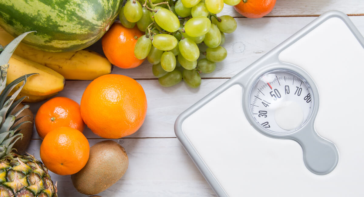 Variety of fruits and a scale