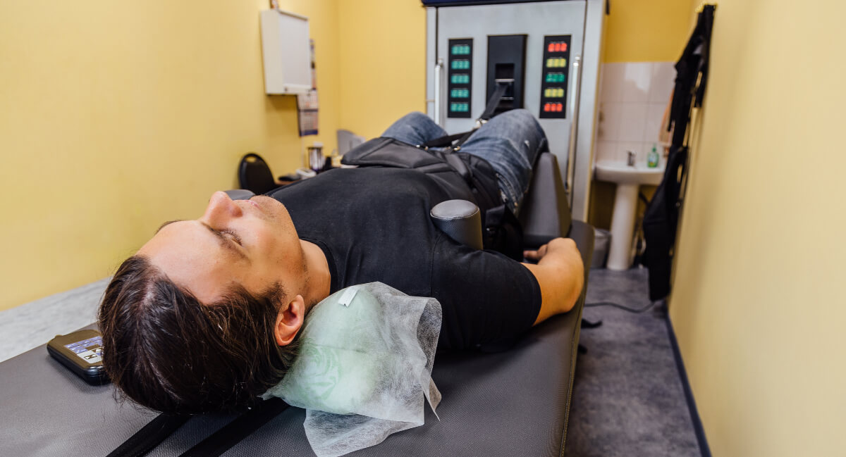 Man receiving spinal decompression treatment
