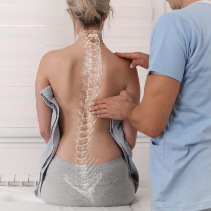 Spine overlay on female patient's back