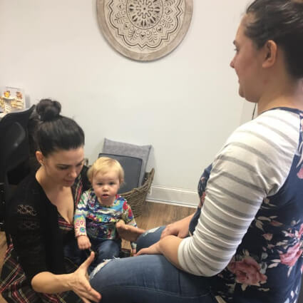 Dr. Amanda with mom and baby