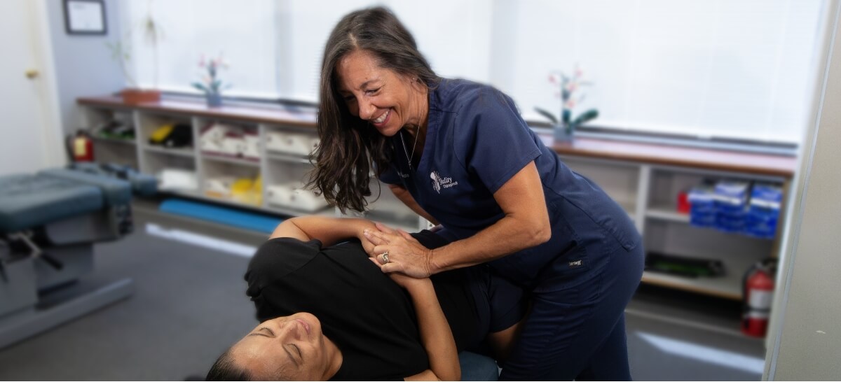 Falls Church chiropractor adjusting a patient