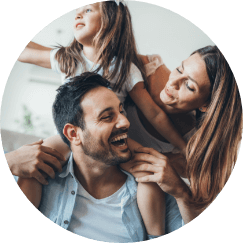 Smiling family of three